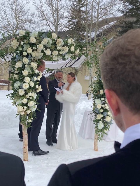 May be an image of 3 people, flower and wedding.jpeg